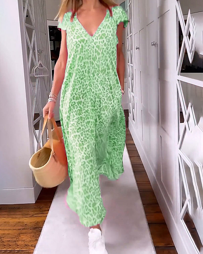 Stella | Ademend Maxi-Jurk Met V-Hals En Zakken